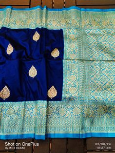 Grab this ravishing Navy blue colour katan banarasi silk saree with contrast wide Sky blue zari weaving border ,for upcoming festive season or any Occasion like party weeding or gifting,and be standout in a pocket friendly price with a excellent quality Saree with gorgeous Look. Soft smooth textured Katan Banarasi Silk Saree with excellent look at budget. Saree has running blouse piece. Dry cleaning recommend only. Due to digital photography color variation is considerable. Banarasi Katan Silk Saree, Katan Saree, Katan Silk Saree, Photography Color, Party Wear Saree, Festive Collection, Katan Silk, Wear Saree, Soft Silk Sarees