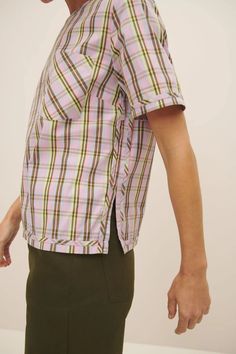 An elevated everyday top, made from 100% certified Fairtrade organic cotton poplin shirting in a joyful woven check. The Adrian Top has a standard fit with bust darts for gentle shaping and side splits for ease of wear. It features a binding detail at the cuffs and hem, and fastens with a button and loop at the back. This garment is completely plastic-free. Sizing: This style is true to size. We recommend taking your normal size. Pink Tartan, Garment Pattern, Garment Labels, Moving Sale, Side Splits, Top Sales, Easy Wear, Cotton Poplin, Workout Tops