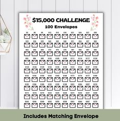 the $ 15, 000 challenge for envelopes is displayed on a white wall next to a