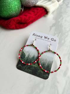 🌿lightweight  🌿red, white, and green glass beads 🌿hand beaded 🌿hypoallergenic earring hooks Christmas Beaded Hoop Earrings, Christmas Hoop Earrings, Holiday Red Beaded Earrings With Ear Wire, Red Colorful Beads Hoop Earrings, Red Beaded Round Hoop Earrings, Red Hoop Earrings With Colorful Beads, Red Hoop Earrings With Tiny Beads, Red Beaded Hoop Earrings, Christmas Beaded Jewelry