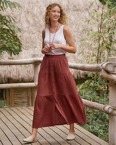 Take this easygoing maxi skirt for a spin any day or night through the season. Airy, soft, and beyond comfy in our organic-cotton double gauze, and detailed with soft gathers, perfectly placed tiers, and a sweep of buttons in front that ends above the hem for added swing.  Exclusive. Pull-on style. Flat front waistband; elastic in back. Angled pockets. Classic Feminine Style, Gauze Skirts, India Clothes, Classic Feminine, Virtual Wardrobe, Tiered Maxi Skirt, Organic Cotton Clothing, Garnet Hill, Boho Skirts