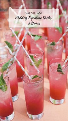 many glasses filled with different types of drinks on a table together and straws sticking out of them