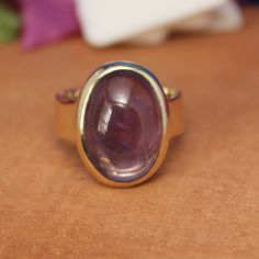 Natural Purple Amethyst Gemstone Ring, Handmade Ring, Rings For Women, Statement Ring, Brass Ring, Anniversary Ring, Boho Rings,  Product Detail Item Code:D219 Material: Brass Weight: 6.70 GMS Gemstone:- Amethyst Stone Size : 11*16 MM Stone Shape: Oval  Ring Size: 4 To 13US SHOP DESCRIPTION: All of our products have 925 stamp. This product is suitable for everyday use and for special occasions as well. All metal, totals and stone weight/measurements are approximated and may differ slightly. All our jewelry are made to order according to customer needs (Ring size, color, metal, etc.) by a professional jeweler. May be very slight variations between the jewelry you receive and the model showing in the picture. Collectors prefer stones without any matrix, and these specimens are considered mor Oval Ring, Purple Band, Oval Rings, Ring Boho, Brass Ring, Recycled Metal, Amethyst Stone, Rings For Women, Anniversary Ring