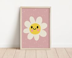 a pink wall with a white and yellow flower on it