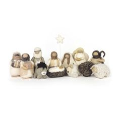 a group of small figurines sitting next to each other