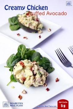 two white plates filled with food on top of a table