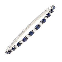 18K gold stretch tennis bracelet with 7.78 ct oval-cut blue sapphires and diamonds Bracelets And Rings, Diamond Tennis Bracelet, Blue Sapphire Diamond, Spring Design, Bespoke Jewellery, Diamond Shop, Tennis Bracelet Diamond, Yellow Diamond, Pink Diamond