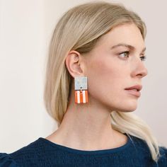 We love a little pattern play, which is why we're excited to introduce the Bloom Double Block Earrings that mix light blue flowers with bold red stripes. Color: blue, red, white and gold Size: 2" x 1" Lightweight Buffalo horn Stainless Steel ear post Your earrings are made from all-natural material and as such the horn color may vary slightly from what is shown. While all horn is very similar in appearance, no two are exactly the same. This guarantees the uniqueness of each piece and ensures you Sarong Dress, Candle Bar, Light Blue Flowers, Summer Gifts, Pattern Play, Pool Days, Dress Gift, Dress Cover, Kids Hats