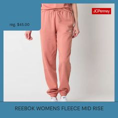 You'll love the vibrant pink hue and sporty aesthetic of these Reebok women's mid-rise fleece jogger pants for lounging or workouts. Crafted from 100% cotton, these cuffed-leg joggers come lined with an embroidered logo, slip pockets, and an elastic-drawstring waist. Wear them with a tee to complete the look. Front Style: Flat FrontClosure Type: Drawstring, Full ElasticFit: Regular FitPockets: 2 Side Slip PocketsRise: Mid RiseFiber Content: 100% CottonFabric Description: FleeceLining: LinedLini… Trendy Pink Sweatpants For Sports, Comfortable Moisture-wicking Sweatpants, Pink Joggers For Sports, Pink Fleece Sportswear Bottoms, Sporty Pink Fleece Bottoms, Pink Spring Sports Joggers, Pink Relaxed Fit Sports Joggers, Pink Relaxed Fit Joggers For Sports, Sporty Pink Fleece Joggers