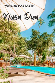 an outdoor swimming pool surrounded by palm trees and umbrellas with the words where to stay in musa dua