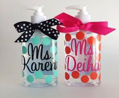 two personalized hand sanitizers with polka dots and a bow on the top