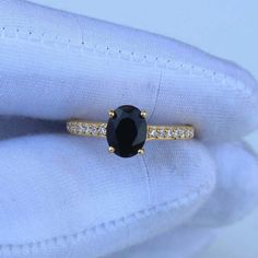 Handmade Product Description Gemstone : Natural Black Onyx Stone Size : 6X8 MM Stone Shape : Oval Secondary Stone : Cubic Zirconia Ring Size : All Size Available Band Color : Silver Plating : Gold Plating Made In Jaipur (INDIA) Payment Policy We accept payment through PayPal Payment should be made within 3 days of purchase. Delivery Time It is Handmade Item So Item will be Shipped within 3 to 5 Days after payment receive. The delivery time usually takes 11 to 24 days, depending which Country & l Black Oval Ring For Wedding, Black Solitaire Ring As Gift, Oval Vs Clarity Birthstone Promise Ring, Black Oval Wedding Ring, Black Oval Rings For Promise, Black Oval Diamond Ring For Anniversary, Black Sapphire Ring Round Cut Gift, Oval Black Rings For Promise, Black Ring With Center Stone As Gift