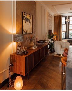 a living room filled with furniture and decor