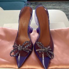 Excellent Condition. Worn Once. Has A Small Nib On The Back Of Right Shoe ( C Pictures). Run 1/2 Size Smaller. Comes With Box And Dust Bag Summer Purple Patent Leather Heels, Lavender Round Toe Heels For Evening, Purple Slingback Pumps With Ankle Strap, Purple Ankle Strap Slingback Pumps With Heel Strap, Purple Patent Leather Heels With Pointed Toe, Designer Open Heel Purple Heels, Luxury Purple Pointed Toe Heels, Luxury Purple Heels With Heel Strap, Luxury Purple Closed Toe Heels