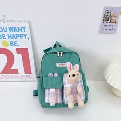 Brand Name: LagemisayMaterial Composition: polyesterOrigin: CN(Origin)Main Material: nylonPattern Type: Animal PrintsModel Number: XBWSW0027Closure Type: zipperItem Height: 11.7inchItem Length: 9.75inchItem Type: School BagsType: BackpackItem Weight: 0.28kgGender: GirlsItem Width: 4.29inchColor: Black/Yellow/Blue/Orange/PurpleBag Decorate: With small bear pendantFeature 1: school backpackFeature 2: School bags for GirlFeature 3: kawaii school BagFeature 4: School backpack for girlFeature 5: Coll Bear Kindergarten, Kawaii School Bag, College School Bag, Purple Rabbit, Cute Carrot, Green Rabbit, School Bag College, Kawaii School, Purple Bag