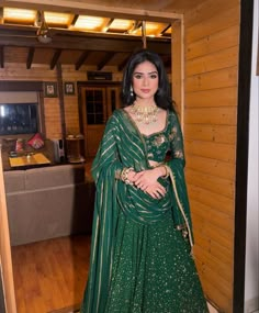 Dark Green Lehenga Simple, Forest Green Indian Outfit, Green Lehenga Makeup, Jaggo Outfit Punjabi Lehnga, Lehenga Long Sleeve, Dark Green Sharara, Long Sleeve Lehenga, Mehndi Ceremony Outfit, Green Indian Suit