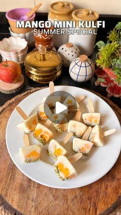 an image of food on a plate with chopsticks in the foreground and other items around it