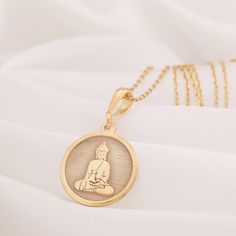 14K Solid Gold Buddha Necklace, Zen Jewelery, Spiritual Necklace, Buddha Pendant, Buddhism Inspired, Enlightenment, Silver Buddha Necklace * Gender : Male / Female * If you prefer a 14k solid gold, we will send a 50cm 14 carat gold chain weighing 1-1.5 grams. * If you prefer a Silver necklace, we will send you a 50cm silver chain.  * If you prefer a 14k solid gold with triple chains, we will send you the lengths of 37/45/50cm as in one as triple that are presented in the models.  * If you prefer Spiritual Round Necklace, Cadmium-free, Spiritual Cadmium-free Round Pendant Necklace, Gold Round Necklace For Meditation, Spiritual Yellow Gold Necklace Cadmium-free, Spiritual Yellow Gold Round Charm Necklaces, Spiritual Yellow Gold Round Charm Necklace, Gold Buddha, Spiritual Necklace, Buddha Necklace