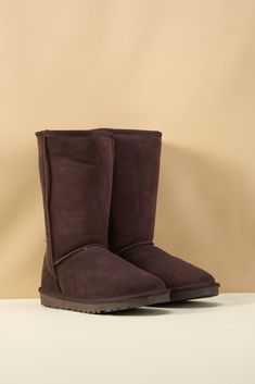 Get ready to elevate your style with SMAIBULUN Ugg's Classic Suede Mid-Length boots in Brown! These boots offer timeless elegance and ultimate comfort. Step into luxurious suede and experience unmatched style while keeping your feet cozy and warm. Don't wait, add these must-have boots to your collection now! 1'' heel 11.5'' shaft 15.5'' circumference Pull-on Suede upper Faux fur lining Man-made sole Classic Winter Boots Medium Width, Classic Wide Calf Boots For Winter, Classic Mid-calf Boots For Winter, Classic Mid-calf Winter Heeled Boots, Classic Mid-calf Heeled Boots For Winter, Classic Brown Mid-calf Boots, Fitted Brown Mid-calf Boots, Classic Brown Mid-calf Snip Toe Boots, Fitted Brown Suede Mid-calf Boots