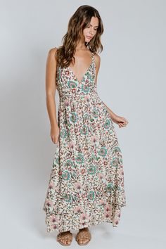 Be the life of the party in our Deema Midi Dress! Made from a soft floral cotton print, this dress will have you feeling flirty and fun. Perfect for any occasion, from brunch to a night out! (Get ready to turn heads, but in a good way!). Style #R5051-30HQ-70 Spring Boho Dress With Floral Print For Garden Party, Printed Sundress For Garden Party, Printed Midi Sundress For Garden Party, Boho Sundress For Garden Party, Midi Length, Boho Sundress Midi Length For Garden Party, Spring Boho Sundress For Garden Party, Casual Boho Dress With Floral Print For Garden Party, Cotton V-neck Dress For Brunch, Summer Printed Midi Dress For Garden Party