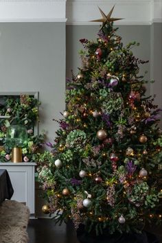 a decorated christmas tree in a living room