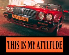 a red car with the words this is my attitude on it