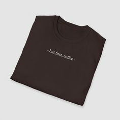 Lannes. - but first, coffee - The unisex soft-style t-shirt puts a new spin on casual comfort. Made from very soft materials, this tee is 100% cotton.The collar is made with ribbed knitting to prevent curling damage. + Made with 100% ring-spun cotton, a lightweight fabric, this unisex t-shirt feels like a bliss to wear all year round. + The classic fit with the crew neckline deliver a clean, versatile style that can match any occasion, whether it's formal or semi-formal. + All shirts feature a pearlized, tear-away label for total wearing comfort. + Made using ethically grown and harvested US cotton. Coffee Color Cotton Tops For Streetwear, Coffee Color Graphic Tee With Crew Neck, Coffee Color Crew Neck Top For Everyday, Coffee Colored Cotton Slogan Top, Everyday Coffee Cotton Top, Coffee Color Crew Neck Graphic Tee, Coffee Colored Graphic Tee With Letter Print, Coffee Color Graphic Tee With Letter Print, Coffee Color Crew Neck T-shirt For Everyday