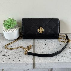 Comes With A Tory Burch Paper Bag Nwt= Brand New With Tag Fast Shipping Smoke Free Enviro Pet Free Home Nwt Tory Burch Willa Chain Wallet Crossbody Bag The Willa Bag Crafted Diamond-Quilted Shrunken Goat Leather Round Three-Piece Double T Logo With Gold Hardware Lined In Herringbone Twill Top Flap Opens To Reveal All The Features Of A Compact Wallet Removable Chain Crossbody Strap And Leather Shoulder Guard Comfort About The Size: 7 3/4 " (L) X 4 1/2" (H) X 1 1/2" Elegant Crossbody Wallet On Chain With Phone Bag, Elegant Clutch Wallet On Chain With Mobile Phone Bag, Elegant Clutch Wallet On Chain With Phone Bag, Elegant Wallet On Chain With Mobile Phone Bag, Formal Crossbody Wallet On Chain With Phone Bag, Formal Crossbody Wallet On Chain For Mobile Phone, Elegant Wallet On Chain For Formal Use, Elegant Formal Wallet On Chain With Mobile Phone Bag, Shoulder Guard