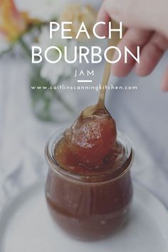 a spoon full of peanut butter and jelly with the words peach bourbon jam on it