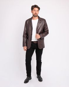 Step up your style game with the Amsterdam Heritage men's leather blazer Crane. Our experienced artisans use only the softest lambskin leather to handcraft each piece with care. Exuding luxury with its sleek and classic silhouette, tailored construction and subtle stitching, the Crane leather blazer is the perfect choice for the man who demands only the finest in quality and style. The men's blazer features button front closure, 2 flap pockets and 2 inside pockets. Whether dressed up for a night Mens Leather Blazer, Monochromatic Outfit, Leather Blazer Jacket, Classic Blazer, Leather Blazer, Blazer Fashion, Crew Neck Shirt, Classic Silhouette, Black Blazers