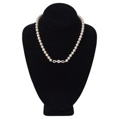 A beautifully made elegant authentic freshwater pearl necklace that anyone can use in their jewelry collection. Pearls are decadent and one of the most coveted materials for jewelry. This necklace is featured in a 18k white gold with a diamond encrusted detailing on the clasp. Pair this elegant piece of jewelry with a Chanel tweed blazer set and some Prada heels for a sophisticated look. Weight: 32.91 Total Length: 17 inches Composition: 18k white gold, Diamonds, Freshwater Pearls Elegant Formal Silver Necklaces, Pearl Necklace With Diamond Accents For Wedding, Luxury Single Strand Diamond Necklace For Formal Occasions, Luxury Single Strand Diamond Necklace For Formal Events, Wedding Pearl Necklace With Diamond Accents, Classic Akoya Pearl Diamond Necklace For Anniversary, Evening Pearl Jewelry In Diamond White, Diamond White Pearl Jewelry For Evening, Elegant Single Strand Round Diamond Necklace