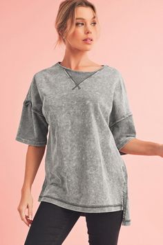 The oversized tee is a relaxed and stylish t-shirt made from a soft and breathable fabric, ensuring comfort throughout the day.With its drop shoulder design and oversized fit, this tee offers a casual and effortlessly cool look that can be paired with jeans, shorts, or leggings for a laid-back style.The tee is suitable for various occasions, including casual outings, lounging at home, or even as a comfortable workout top, providing both style and functionality.Fabric Contents: Product Weight: 0. Trendy Relaxed Fit T-shirt For Layering, Oversized Athleisure T-shirt For Summer, Casual Washed Boxy Fit Tops, Washed Drop Shoulder Tops For Loungewear, Drop Shoulder Washed Top For Loungewear, Sporty T-shirt With Relaxed Fit And Shirttail Hem, Casual Boxy Fit Top For Layering, Washed Boxy Fit Top With Crew Neck, Oversized Washed Drop-shoulder Top