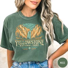 Show off your love of Yellowstone's Upper Falls and its majestic mountains with our Yellowstone National Park Comfort Colors Shirt! This vintage style crewneck is all about embracing the great outdoors! It features a custom design that showcases the beauty of the Montana and Wyoming landscape complete with the iconic Upper Falls which the park is known so well for! The comfort colors 100% preshrunk cotton fabric has that comfy, lived-in feel, that's like a hug every time you put it on! Now you c Casual Soft-washed Tops For Outdoor, Casual Soft-washed Tops For Outdoor Activities, Green Relaxed Fit Tops For Hiking, Relaxed Fit Soft-washed Top For Outdoor, Green Cotton Top For Hiking, Green Crew Neck Shirt For Outdoor Activities, Crew Neck T-shirt For Outdoor Activities In Fall, Green Letter Print Tops For Hiking, Green Tops With Letter Print For Hiking