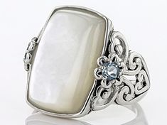 20x14mm Cushion White Mother Of Pearl And 0.34ctw Round Glacier Topaz (TM) Rhodium Over Sterling Silver Ring. Measures Approximately 0.86"L x 0.84"W. Finished Under Gallery. Not Sizeable. Oxidized White Multi-stone Moonstone Ring For Formal Occasions, Formal White Multi-stone Moonstone Ring, Elegant Formal Multi-stone Moonstone Ring, Elegant Moonstone Ring With Gemstone Accents For Formal Occasions, Elegant Moonstone Ring With Gemstone Accents For Formal Events, Elegant Formal Moonstone Ring With Gemstone Accents, Elegant Multi-stone Moonstone Ring As Gift, Cushion Ring, Sky Blue Topaz