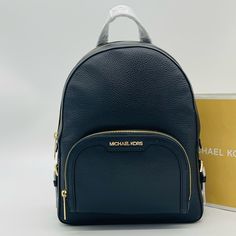 Brand New With Tag Michael Kors Jaycee Medium Backpack Black Color: Black Medium Backpack Pebbled Leather 100% Leather Gold-Tone Hardware 8.75"W X 12"H X 4.25" D Exterior Details: Front Zip Pocket Interior Details: Back Zip Pocket, Tech Compartment, Front Slip Pocket Lining: 100% Polyester Zip Fastening Imported Classic Backpack With Branded Hardware, Elegant Michael Kors Backpack For Travel, Classic Michael Kors Backpack For Everyday Use, Elegant Michael Kors Leather Backpack, Michael Kors Modern Standard Backpack, Designer Michael Kors Standard Backpack, Designer Michael Kors Backpack, Luxury Michael Kors Leather Backpack For Travel, Luxury Michael Kors Standard Backpack