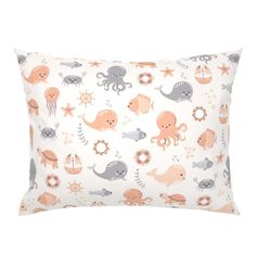 an ocean themed pillow with octopus, whale and sea animals on white background for kids's room decor