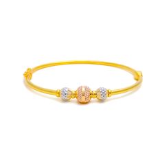 This delicate 22k gold bangle bracelet exudes poised elegance and refined beauty. Weighing 10.7 grams, it offers a perfect balance of luxury and comfort. The bracelet features a harmonious blend of yellow, white, and rose gold finishes, adding a touch of subtle sophistication. With a diameter of 2.25 inches and an oval opening shape, it ensures a graceful and comfortable fit. Designed for convenience, it is openable with a spring hinge and offers the option of no lock or push lock for secure wear. This single-piece bangle is perfect for adding a touch of delicate charm to any outfit, making it a lovely addition to your jewelry collection. PRODUCT DETAILS Gold Purity(karat): 22k Gold Weight(grams): 10.7 Item Finish: Yellow + White + Rose Gold Bangle Diameter: 2.25" Bangle Opening Shape: Ova 22k Gold Bangles, Bridal Jewelry Necklace, Diamond Pendant Sets, Rose Gold Bangle, Modern Bracelets, Fancy Necklace, Fancy Rings, Mens Gold Rings, Diamond Necklace Set