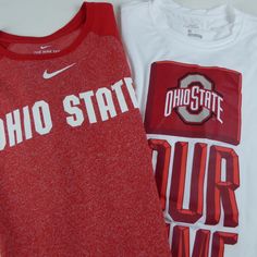 Ohio State Buckeyes Shirt Set Officially Licensed Gear T-Shirt Bundle (2 Shirts) Osu & Nike Branding Short Sleeve Tees Brand New With Tags Red: Athletic Cut Ohio State And Nike Branding White: Dri-Fit Tech Ohio State Our Time Graphics Chest Across Front: Xl: 24. L: 21.5” Length From Top Of Collar To Bottom: 29-30” Brand New With Tags Go Bucks...O-H Pricing Is Fair And Quite Firm . Please Let Us Know If You Have Any Questions. Collegiate Red Summer Tops, Nike Casual Top In University Red, Nike Red T-shirt For Summer, Red Nike T-shirt For Summer, Nike Sporty Tops In University Red, Nike Sporty University Red Tops, Red Nike Tops With Team Spirit, Nike Collegiate Red Tops, Nike Red Collegiate Top