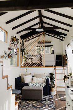 a living room filled with furniture and decor