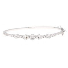 1.75 CTS. Dainty Natural Diamond Bangle Bracelets 18K White Gold Jewelry, Handmade Stackable Bangle For Her, Wedding Diamond Sleek Bangle STONE DETAILS : ❋ Stone : Natural Diamond  ❋ Diamond Shape : Princess, Baguette & Round Cut  ❋ Diamond Color : As Shown In Picture ❋ Diamond Weight : 1.75 Cts. Approx. ❋ Diamond Quality : FG-SI ❋ Diamond Type : Natural METAL DETAILS : ❋ Metal Purity : Solid 18K Gold ❋ Metal Color : White Gold ❋ Bracelet Length : 56x47 MM Approx. ❋ Gross Weight : 10.29 Gms. App Wedding Diamond, Stackable Bangles, Diamond Bangles Bracelet, White Gold Bracelet, Wedding Jewelry Bracelets, Minimalist Bracelet, Diamond Bangle, White Gold Jewelry, Diamond Color