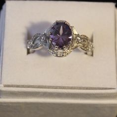 .925 Silver 2 Ctw Purple Cz 5mm X 5mm Size 9 Brand New, Never Worn Will Come With Box Or Pouch Silver Cubic Zirconia Birthstone Ring For Promise, Silver Cubic Zirconia Birthstone Ring For Formal Occasions, Silver 925 Stamped Birthstone Ring For Anniversary, Silver Amethyst Ring In Halo Setting, Silver Amethyst Ring With Diamond Accents For Promise, Amethyst Cubic Zirconia Ring With Halo Setting For Anniversary, Silver Amethyst Promise Ring With Diamond Accents, Elegant Silver Cubic Zirconia Birthstone Ring, White Gold Sterling Silver Amethyst Ring With Diamond Accents