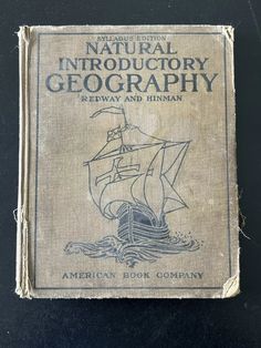 an old book with the title natural history of geography