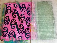 two pieces of art work with different colors and designs on them, one is pink, the other is green