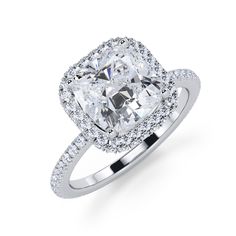 a cushion cut diamond ring with double halos