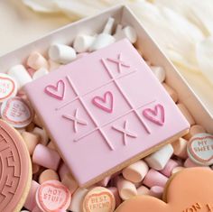 a box filled with lots of cookies and candies