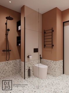 a bathroom with a toilet, sink and shower