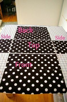 four black and white polka dot placemats with the words back to top front