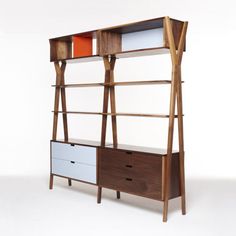 a bookcase with drawers and shelves on it's sides, against a white background