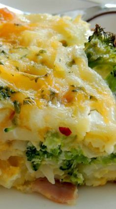 broccoli and cheese casserole on a white plate