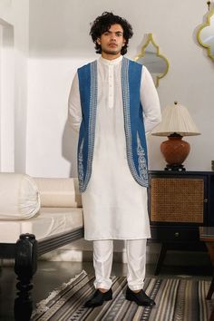 Cobalt blue longline bundi with resham and zari embroidery in mandala pattern. - Aza Fashions Traditional Blue Nehru Jacket For Eid, Traditional Blue Nehru Jacket, Diwali Traditional Cotton Nehru Jacket, Traditional Jamawar Nehru Jacket, Traditional Nehru Jacket With Resham Embroidery For Eid, Bohemian Jamawar Kurta With Chikankari Embroidery, Traditional Sleeveless Embroidered Salwar Kameez, Traditional Nehru Jacket For Eid, Traditional Embroidered Sleeveless Salwar Kameez